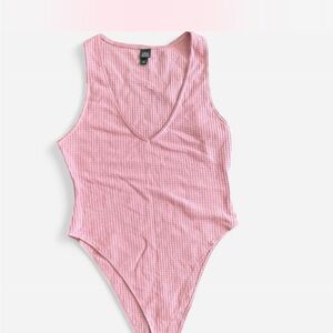 Pink body suit
